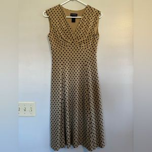 Tan with black polka dots.